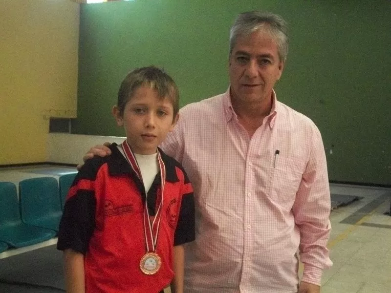 puesto 7 a nivel nacional categoría preinfantil,, con el presidente de la federación de tenis de mesa de Polombia.